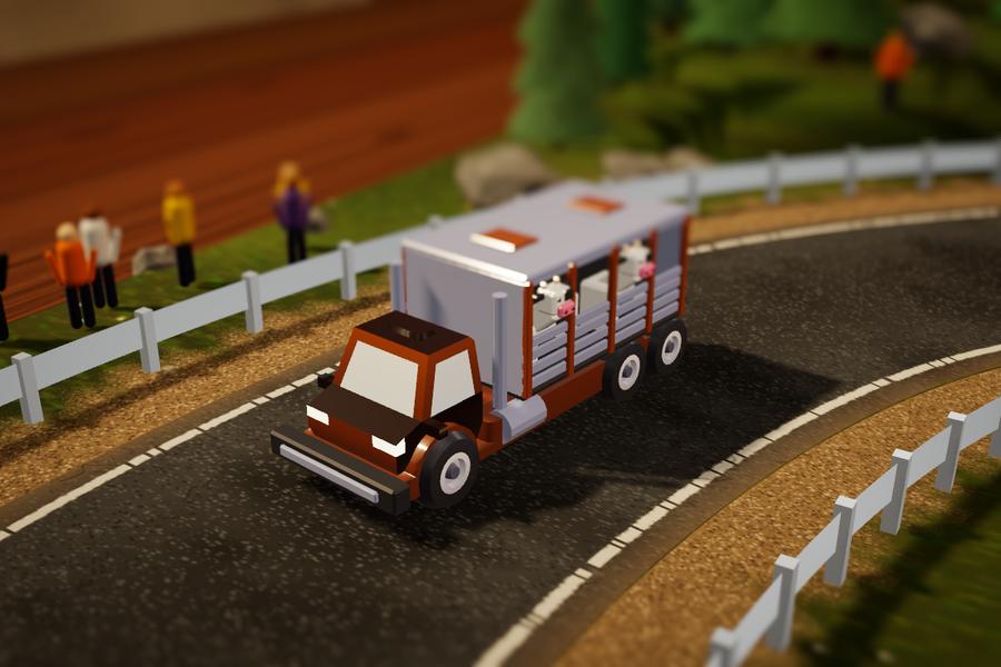 Cattle Hauler, the livestock truck with cows looking out through the slats