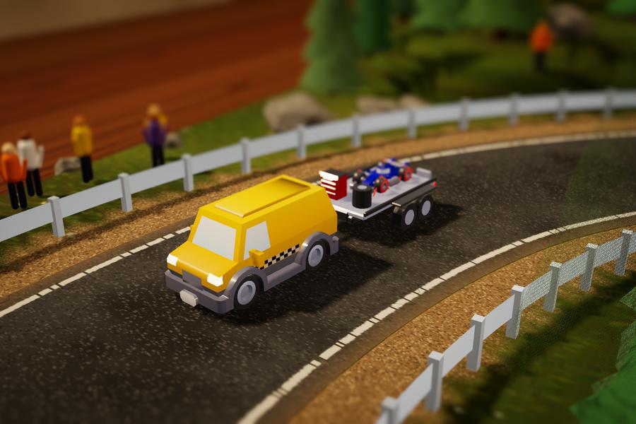Pit Crew, the team van towing a race car on a trailer