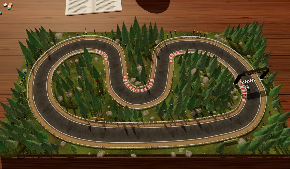 Alpine Ridge seen from above: a winding rally road through a pine forest on a wooden table